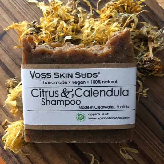 Shampoo Bar Citrus and Calendula PRODUCT FOOTPRINTS Natural ingredients Phthalate, Sulfate, Petroleum & Paraben Free Vegan Free of Synthetic Fragrances Free of Synthetic Dyes GMO & Gluten-free Non Toxic Handmade Sustainable Innovation Made in the USA Cruelty Free Zero Waste Low Carbon Footprint eco friendly   Holiday care package gift box gift for her relaxation gift self care box self care gift box spa gift box spa gift set thank you gift box birthday gift new mom gift relaxing bath set